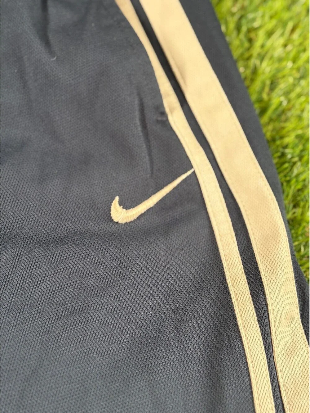 Vintage Nike 2000s navy polyester track pants, men's size M